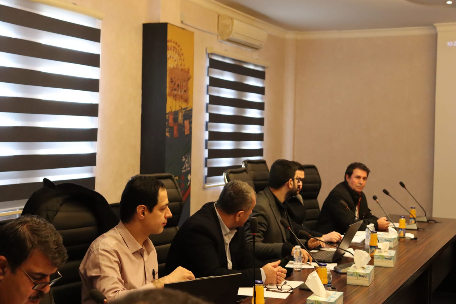 Representatives discussing institutional collaboration and resource sharing